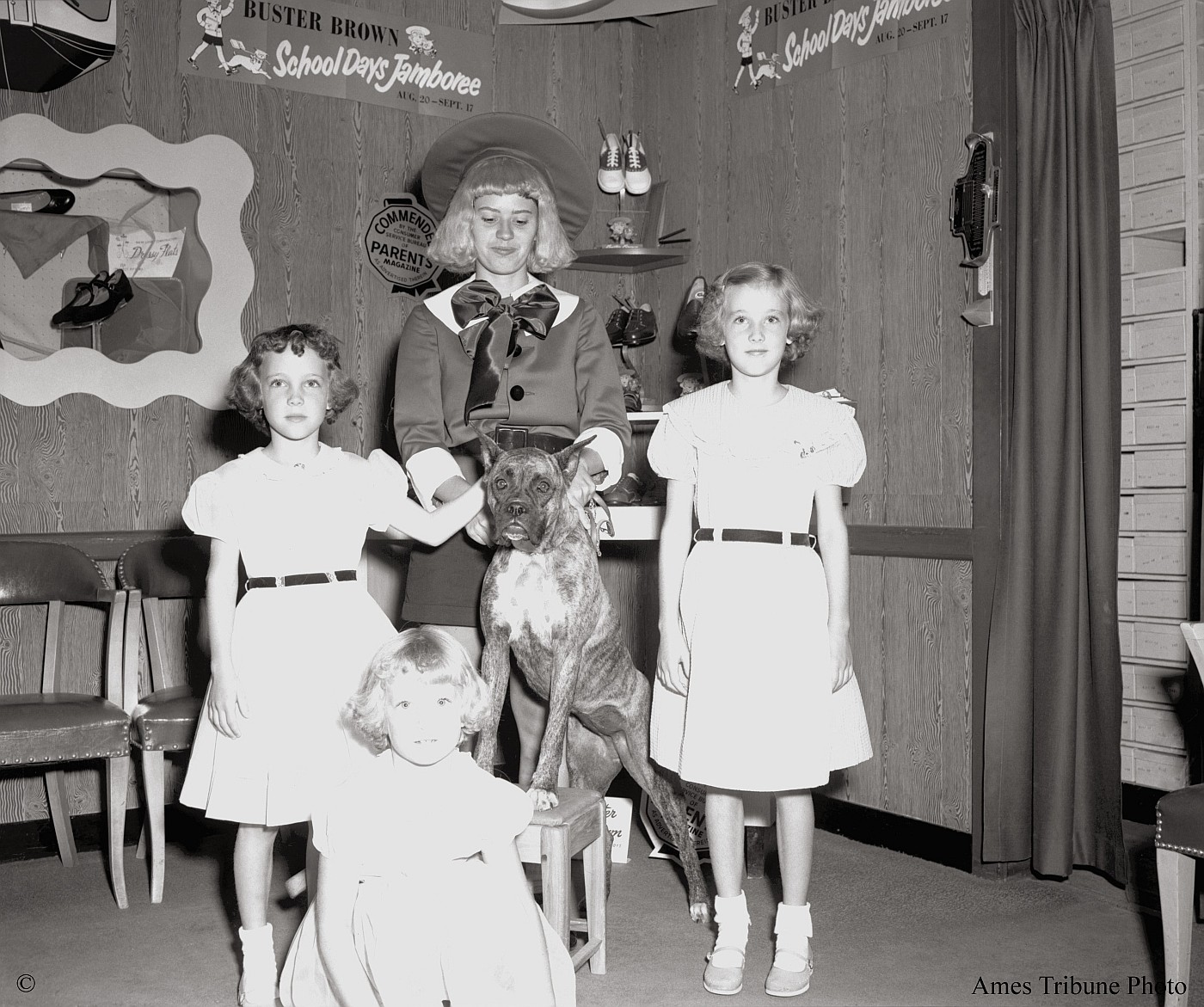 Children appear with Buster Brown at shoe store