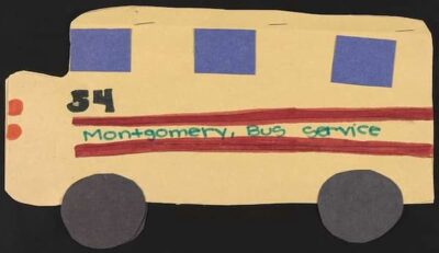 This is a colorful construction paper bus made by a child and commemoratiing the Montgomery Bus Boycott.