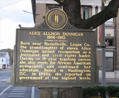 Street signage describing Alice Allison Dunnigan's accomplishments.