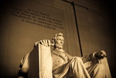 A photograph of the Lincoln Memorial in Washington, D.C. The phtographer shows a view that might be what a visitor would observe looking up from the side. istockphoto.com