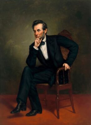 a color painting of Abraham Lincoln as a younger man. He leans forward, elbow on knee and his right hand holding his head in a thoughtful way.