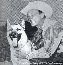 Black-and-white promotion photograph of Bullet and Roy in full cowboy regalia.