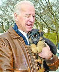 Vice President-elect Biden with Champ as a puppy