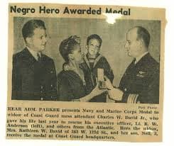 The newspaper photo shows Mrs. DAvid and her son Neil at the awards ceremony where Charles David was posthumously given the Navy and Marine Corps Medal.