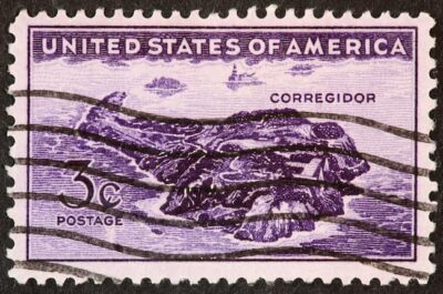 A 3 cent postal stamp with a drawing of Corregidor where the military retreated for a month before surrendering.