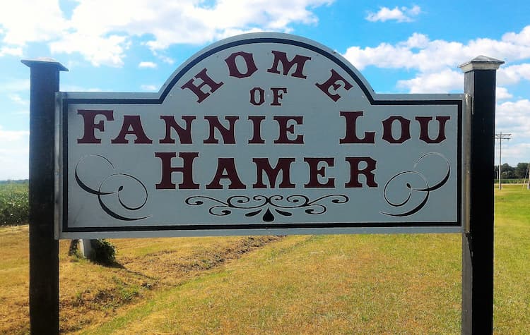 A painted sign marking Fannie Lou Hamer's home