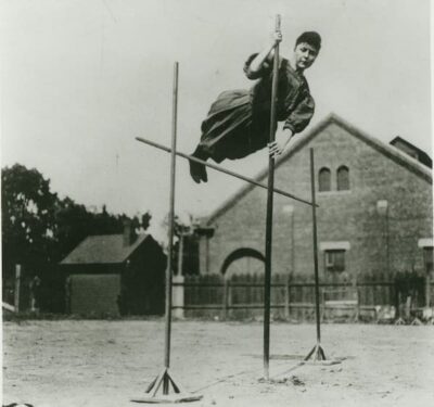 Ina Gittings demonstrating the pole vault. University of Arizona Special Collections Library