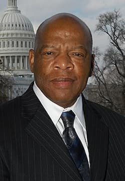 A professional photo of John Lewis in front of the Capitol.