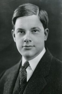 A school yearbook picture of Joyce Kilmer. He wears a suit and tie and his hair is nicely combed.