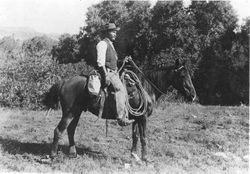 George McJunkin astride his horse