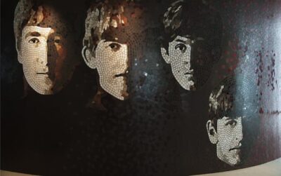 This is a mosaid depiction of an early grouping of the Beates with John George, Paul and Ringo in that order.