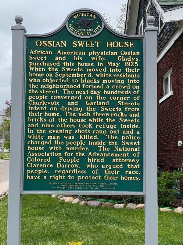 The historic plaque in front of Ossian Sweet's former home explaining what the family went through.