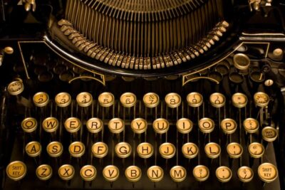 photo of old keyboard with yellowing keys