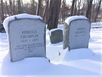 A photograph of the new headstones for Rebecca and Arthur Crumpler. The headstones are side-by-side and they are covered with about two inches of snow.