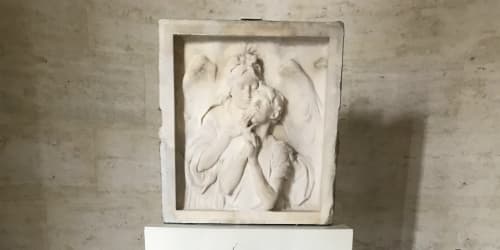 This is a photo of the marble bas-relief that was made by Karl Bitter and salvaged to create a new monument.