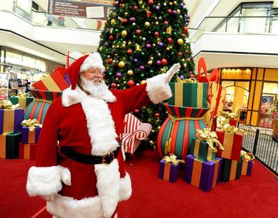 Santa at Department store wavingto visitors