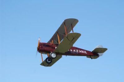 This is a photograph of the type of plane used to carry the mail in the 1920s. It is a biplane with the words "U.S. Air Mail" painted on the side.