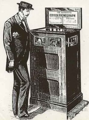 This is a sketch of an early jukebox (phonograph). A man stands with a listening tube in his ear in order to hear the music.