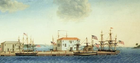 This is a view of the Crowninshield Wharf in Salem harbor. It's a very beautiful painting with schooners at the dock