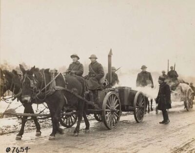 Two horses pull a wagon that will have the necessary items needed for preparing meals for the troops.