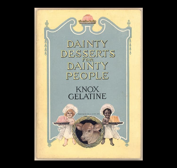 Cover for "Dainty Desserts for Dainty People." Both children--a white and a Black child-- are dressed in chef hats and are carrying similar desserts made with Knox Gelatine.
