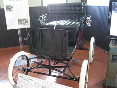 a museum displays what was called  locomobile, a carriage with no horse needed.