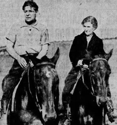 Senator Schall and his wife out for a horseback ride. They are both dressed casually.