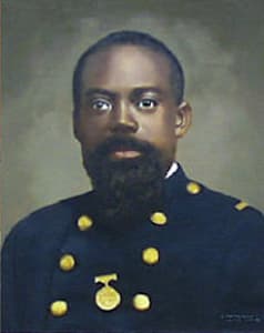 A colorized professional photo of a young and distringuished Carney in his dress uniform that he would have worn as part of the 54th Regiment.