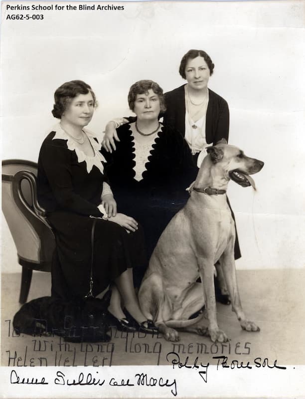 Helen Keller, her assistant Polly Thompson, and Anne Sullivan with her Great Dane, Sieglinde.